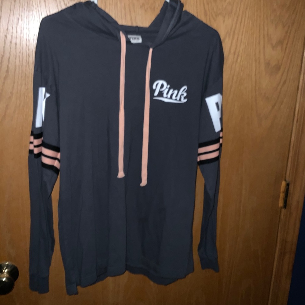 A Victoria Secret zip up sweatshirt